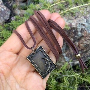 Leather suede cord moon Sundance charm necklace